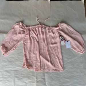 Woman’s pink blouse